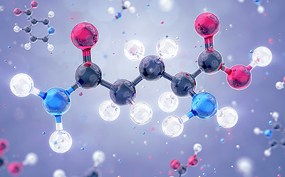 Detailed molecular model with black, red, blue, and white atoms floating against a softly lit background.