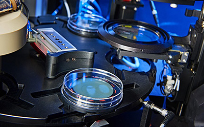 Close-up of the Growth Direct® System's detection chamber, showcasing petri dishes and automated colony enumeration and detection. Close-up of the Growth Direct® System's detection chamber, showcasing petri dishes and automated colony enumeration and detection.