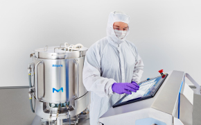 A photo of an Operator setting up a mixer