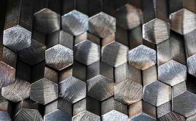 Non-Ferrous Metal Rods Stack of hexagonal non-ferrous metal rods.