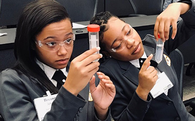 BioSTL BioSTL Girls Observing Flasks