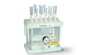 SPE vacuum manifold Solid-phase extraction (SPE) vacuum manifold with multiple sample tubes mounted on top, designed for parallel sample preparation and cleanup in environmental and analytical testing workflows.