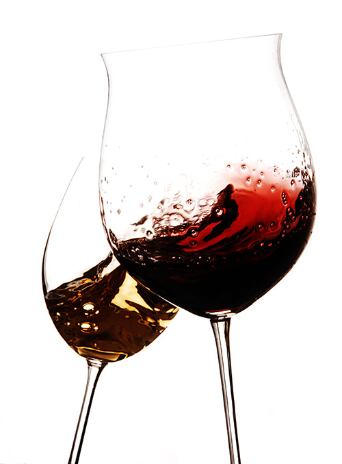 Heavy metals are often found in wine Two glasses of splashing red wine