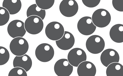 Close-up image of synthetic activated carbon Close-up view of synthetic activated carbon particles, showcasing their spherical shape and dark coloration against a white background.
