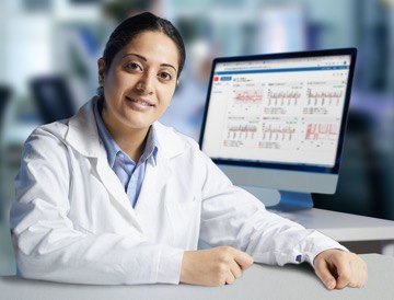 Bioprocess engineer at her computer using ProcessPad for CPV and APQR