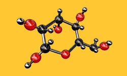 3D分子模型，黑球和红球代表原子，连接的棍子代表化学键。黑球较小，可能代表碳原子，红球可能代表氧原子，说明是一种有机化合物。