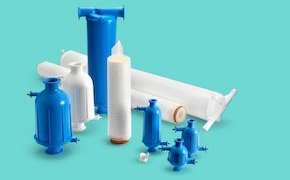 A collection of laboratory equipment, including various blue and white containers, tubes, and a syringe, arranged on a light turquoise background.