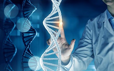 A scientist in a lab coat touches a glowing point on a 3D-rendered DNA double helix, symbolizing genetic research or biotechnology. Multiple DNA strands are visible in the background, with a blue, high-tech digital interface theme.