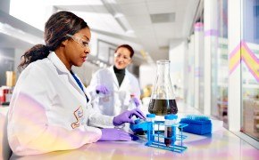 Scientist at bench performing qualification testing