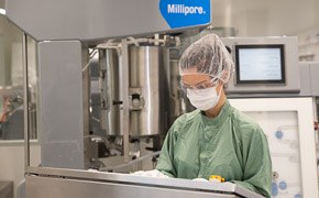 Female operator working on IVT reactor console