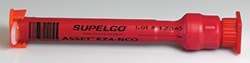 a red cylindrical object with black measurement markings. It is labeled “SUPELCO” along with “Lot 12345” and “ASSET FRANCE”.