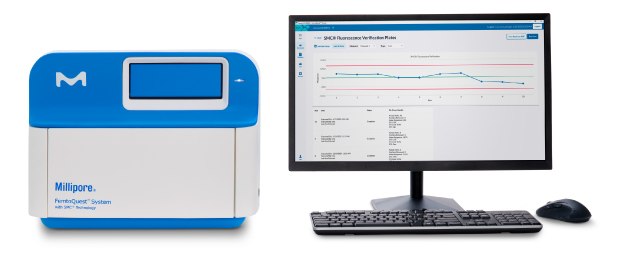 Photograph showing FemtoQuest™ system on the left and a computer monitor with keyboard and mouse on the right.