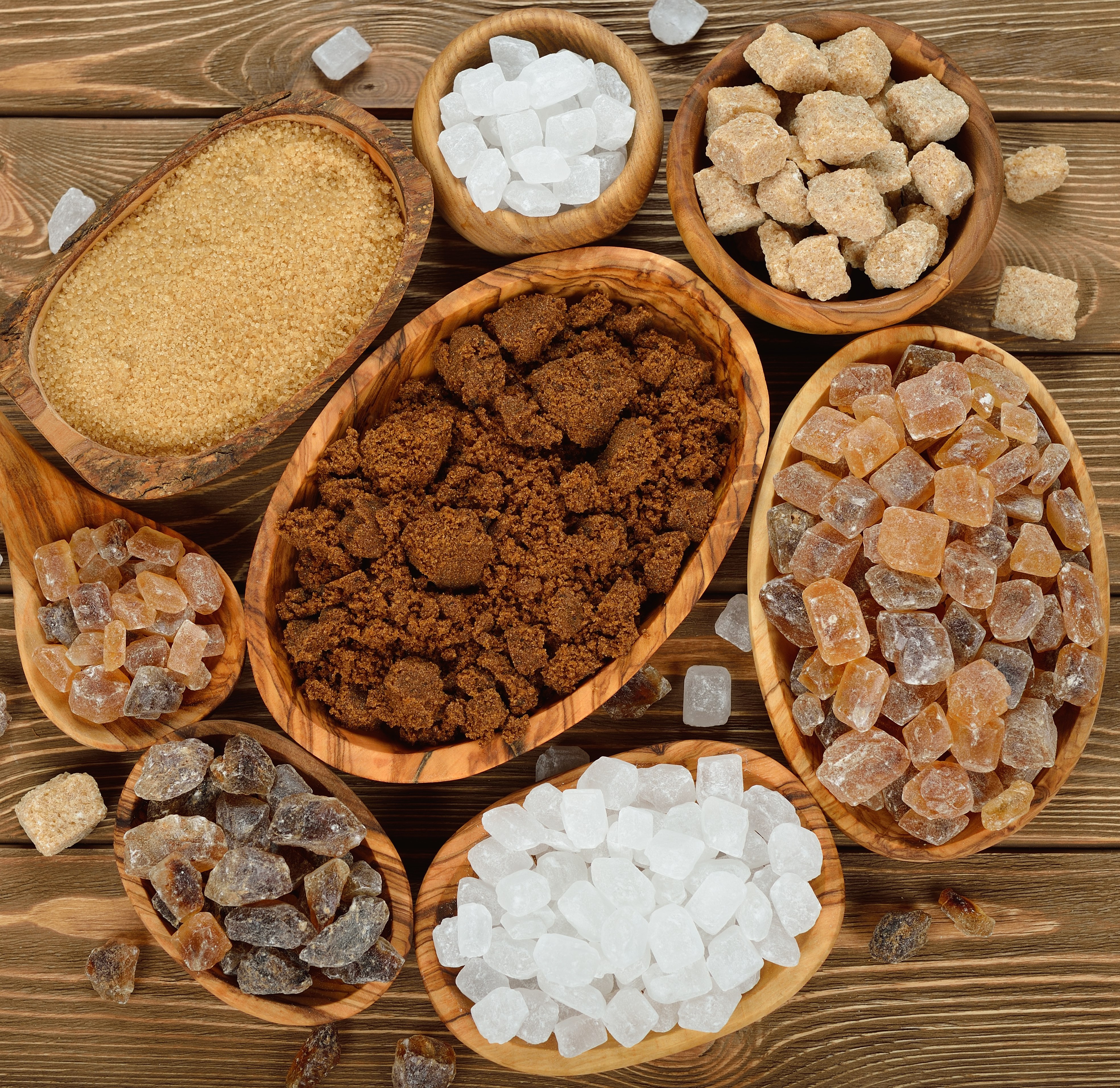 different types of Sugars, including, brown, white in various sizes.