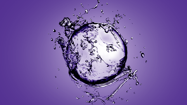 Water drop splash on purple background